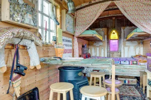 An image of the living area and bedrooms in our Avon Wagon, the perfect getaway for families looking for a magical experience in Dalby Forest, North Yorkshire.