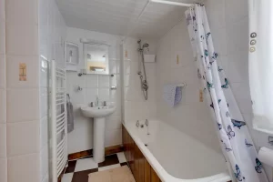 An image of our bathroom in our family holiday cottage in Scarborough, both Bath and Shower facilities available.