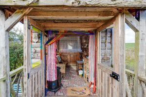 An image of the interior in our Oxo bickley rigg farm glamping wagon, we're based in Dalby Forest, North Yorkshire. Outdoor space and family fun for all.