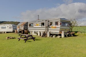 An image from outside of our popular portmaster glamping wagon based in Dalby Forest, North Yorkshire. Enjoy the family space and relaxing environment.