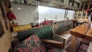 An interior image of the portmaster glamping wagon based in Dalby forest, North Yorkshire.