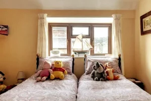 An image of our other bedroom in the Scarborough family holiday cottage. Single beds.